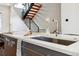 Close up of stainless steel sink and island in a modern kitchen at 2540 N Clay St, Denver, CO 80211