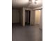 The unfinished basement features an open layout with gray floors and white walls at 12640 W Virginia Ave, Lakewood, CO 80228