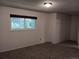 Neutral bedroom with carpet, large window, closet and ample natural light at 12640 W Virginia Ave, Lakewood, CO 80228