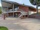 Community clubhouse with pool access and covered seating area at 12640 W Virginia Ave, Lakewood, CO 80228