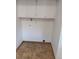 Clean laundry area with tile floor, cabinets and plumbing for washer and dryer installation at 12640 W Virginia Ave, Lakewood, CO 80228