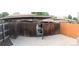 Assigned parking in a carport with a wooden privacy fence for each home at 12640 W Virginia Ave, Lakewood, CO 80228