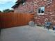 Spacious patio with partial privacy fence, ideal for outdoor enjoyment and entertaining at 12640 W Virginia Ave, Lakewood, CO 80228