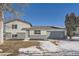 Ranch style home with gray exterior, attached garage, and small yard at 3369 E 118Th Way, Thornton, CO 80233