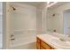Full bathroom with shower/tub combo and wood vanity at 470 Grey Swallow St, Brighton, CO 80601
