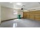 Attached garage with light grey flooring and automatic opener at 470 Grey Swallow St, Brighton, CO 80601