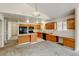 Modern kitchen with light countertops and dark wood cabinets at 470 Grey Swallow St, Brighton, CO 80601