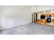 Kitchen with an island, wood cabinets, and black appliances at 470 Grey Swallow St, Brighton, CO 80601