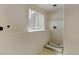Unfinished basement laundry area with storage shelving at 470 Grey Swallow St, Brighton, CO 80601