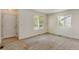 Bright living room with neutral carpeting and ample natural light at 470 Grey Swallow St, Brighton, CO 80601