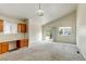 Bright and airy living room with access to a backyard patio at 470 Grey Swallow St, Brighton, CO 80601