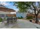Backyard with outdoor dining, a shed for storage, and seating arrangement for outdoor gatherings at 11551 W 103Rd Dr, Broomfield, CO 80021