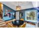 Inviting dining area featuring hard wood floors and natural light at 11551 W 103Rd Dr, Broomfield, CO 80021