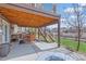 A backyard patio with a built-in grill, outdoor dining, with stairs leading to the second-story deck at 854 Countrybriar Ln, Highlands Ranch, CO 80129