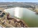 Panoramic aerial view of a serene lake, showcasing waterfront property and natural beauty at 2730 River View Dr, Broomfield, CO 80023