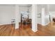 Open-concept dining room featuring hardwood floors and large windows for ample natural light at 2730 River View Dr, Broomfield, CO 80023