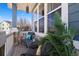 Inviting front porch with comfortable seating and decorative accents, perfect for relaxation and enjoying the outdoors at 2730 River View Dr, Broomfield, CO 80023