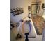 Bathroom includes a large soaking tub, tiled flooring, shower, and modern decor at 6833 S Miller St, Littleton, CO 80127