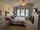 Comfortable bedroom with vaulted ceiling and a large window at 6833 S Miller St, Littleton, CO 80127