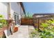 Private backyard patio with a wooden fence at 3608 W Radcliff Ave, Denver, CO 80236