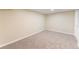 A cozy bedroom with soft, neutral carpeting and a clean, minimalist aesthetic offers a peaceful retreat at 3608 W Radcliff Ave, Denver, CO 80236