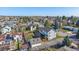 Aerial view of the neighborhood, showing the backyard, deck and detached garage at 8225 S Cody St, Littleton, CO 80128