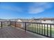 A lovely deck shows expansive backyard and neighborhood views at 8225 S Cody St, Littleton, CO 80128
