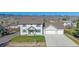 Charming two-story home with a well-maintained lawn and a convenient two-car garage at 8225 S Cody St, Littleton, CO 80128