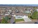 Inviting two-story home boasts a well-manicured lawn and an attached two-car garage at 8225 S Cody St, Littleton, CO 80128