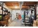 Unfinished basement featuring work out area, storage, and laundry hookups at 17664 E Loyola Dr # C, Aurora, CO 80013