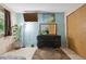 Relaxing bedroom with a colorful art and ample natural light at 17664 E Loyola Dr # C, Aurora, CO 80013