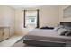 Tranquil bedroom featuring a sleek bed, streamlined furnishings, and a calming color scheme for a peaceful retreat at 17664 E Loyola Dr # C, Aurora, CO 80013