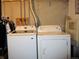 Practical laundry room with modern washer and dryer units for household convenience at 17664 E Loyola Dr # C, Aurora, CO 80013