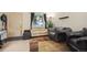 Inviting living room with plush seating, neutral walls and modern rug at 17664 E Loyola Dr # C, Aurora, CO 80013
