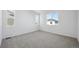 Bedroom featuring neutral-colored carpet and multiple windows for natural light at 1374 Penner Dr, Erie, CO 80026