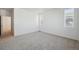 Bedroom with neutral carpet and windows for natural light at 1374 Penner Dr, Erie, CO 80026