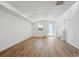 Bright living room features beautiful hardwood flooring and recessed lighting at 1374 Penner Dr, Erie, CO 80026