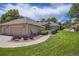 Attractive home with a well-manicured lawn and lush landscaping for great curb appeal at 7769 W 70Th Dr, Arvada, CO 80004