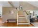 Stairway that creates a seamless flow into the living space at 12 Long Spur, Littleton, CO 80127