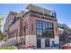 Exterior view of Odell Brewing Co. showcasing its multi-level design and inviting outdoor seating area at 1640 Winona Ct, Denver, CO 80204