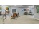 Spacious finished basement featuring modern fireplace, sitting area and finished flooring at 16815 E Prairie Goat Ave, Parker, CO 80134