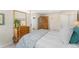 Serene bedroom with ample closet space and natural light from the windows at 7427 W Cedar Cir, Lakewood, CO 80226