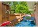 Cozy patio with comfortable seating and outdoor grill, perfect for relaxation at 7427 W Cedar Cir, Lakewood, CO 80226