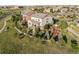Two-story home with backyard deck, stone patio, and landscaped garden at 3741 Harvard Pl, Broomfield, CO 80023