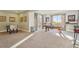 Expansive game room with a pool table, foosball table, and large windows at 3741 Harvard Pl, Broomfield, CO 80023