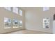 Bright living room with soaring ceilings and many windows at 39857 Floyd St, Elizabeth, CO 80107