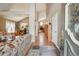 Spacious foyer featuring hardwood floors, high ceilings, and seamless access to the living areas at 17038 Lamar Dr, Parker, CO 80134