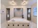 Bright bathroom showcasing a large soaking tub and dual shower rooms at 1648 Exquisite St, Castle Rock, CO 80109