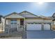 Charming single-Gathering home featuring a two-car garage and welcoming front porch at 615 Twilight St, Erie, CO 80516