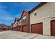 Charming townhomes feature individual garages and classic brick architecture, ideal for a comfortable and convenient lifestyle at 1379 Charles # 4, Longmont, CO 80503
